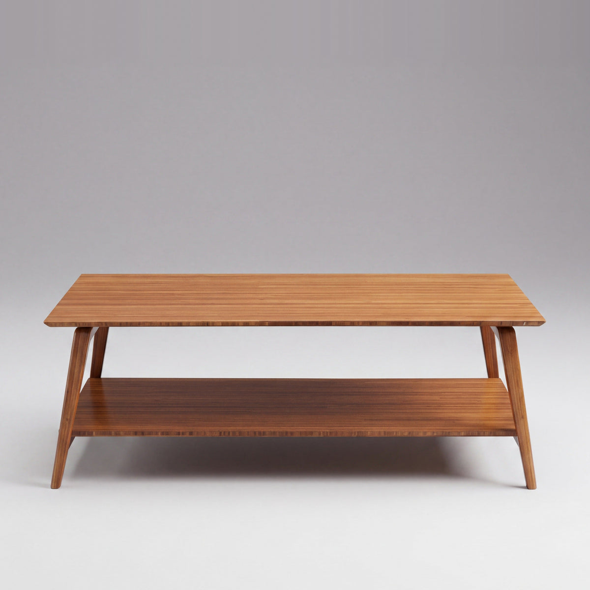 Greenington Antares Coffee Table in Amber bamboo, on a studio background