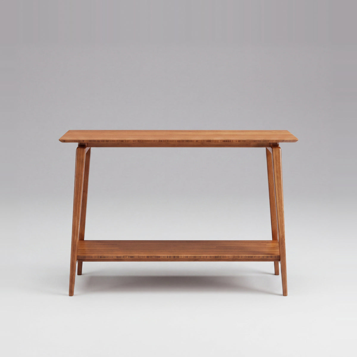 Greenington Antares Console Table in Amber bamboo, on a studio background