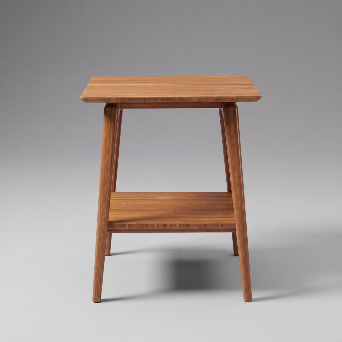 Greenington Antares End Table in Amber bamboo, on a studio background