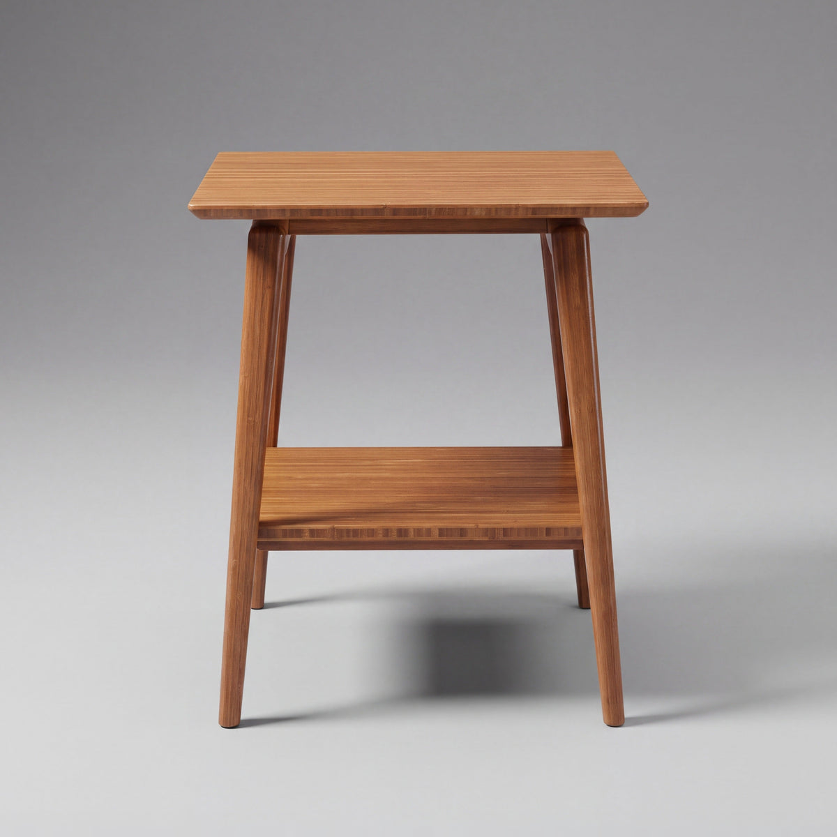 Greenington Antares End Table in Amber bamboo, on a studio background