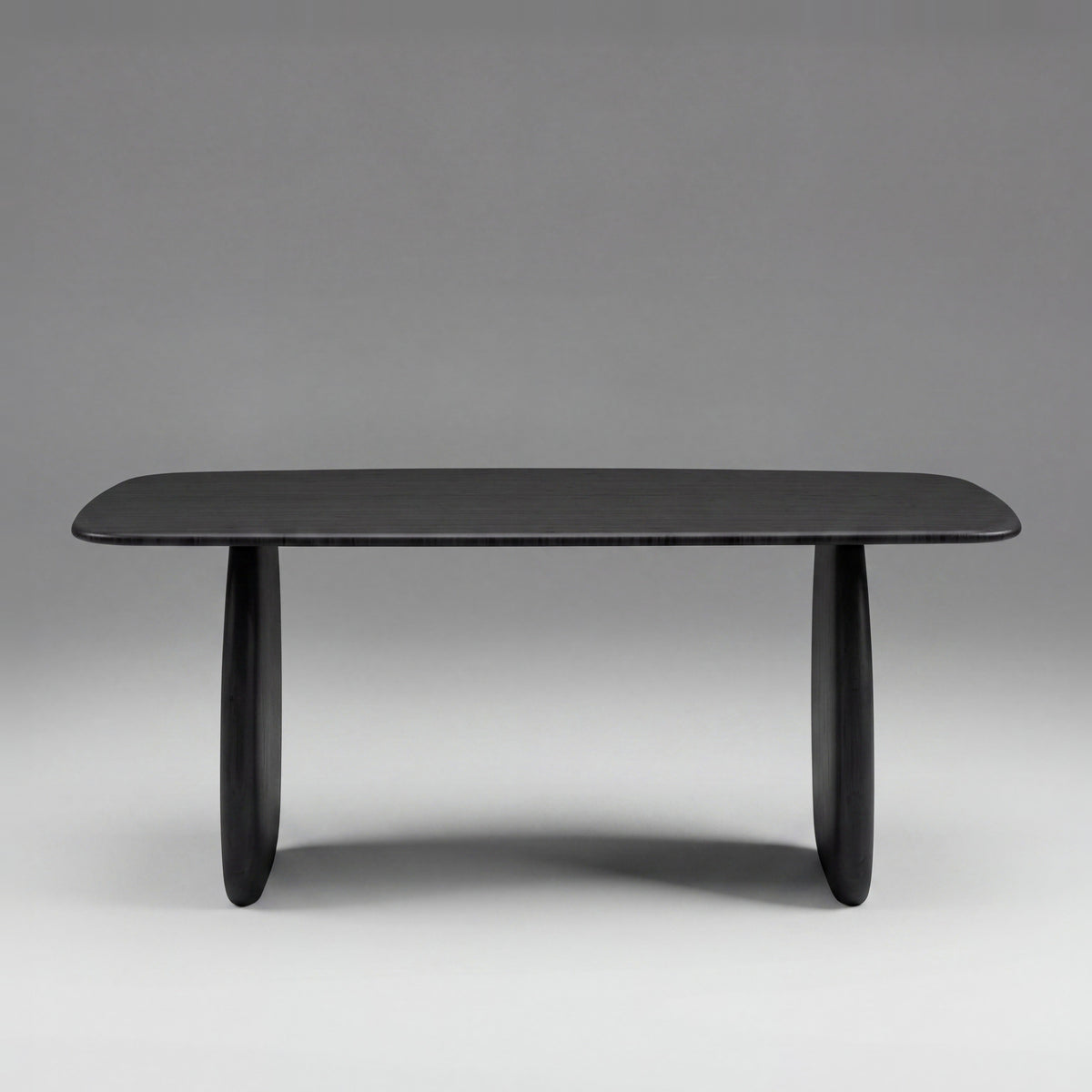 Greenington Aria Dining Table (72") in Caviar bamboo, on a studio background