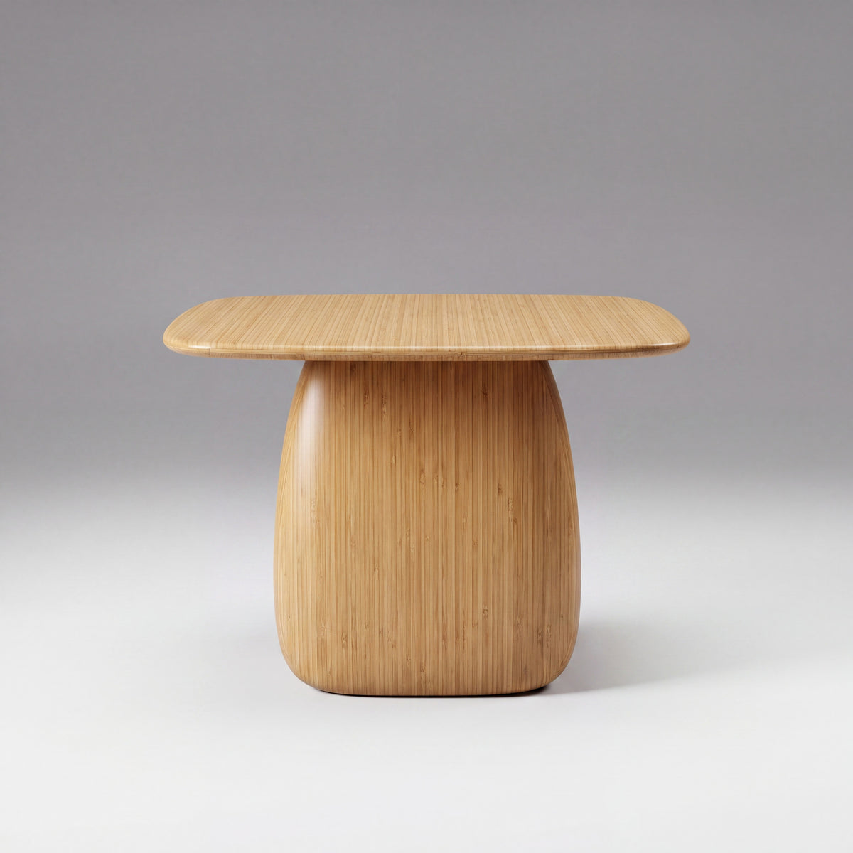 Greenington Aria Dining Table (84") in Wheat bamboo, studio photo on a plain background