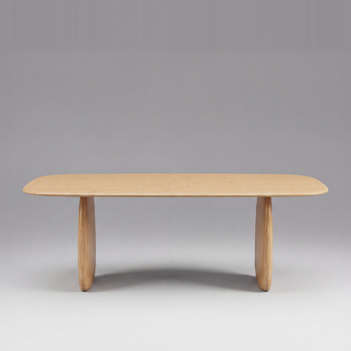 Greenington Aria Dining Table (84") in Wheat bamboo, on a studio background