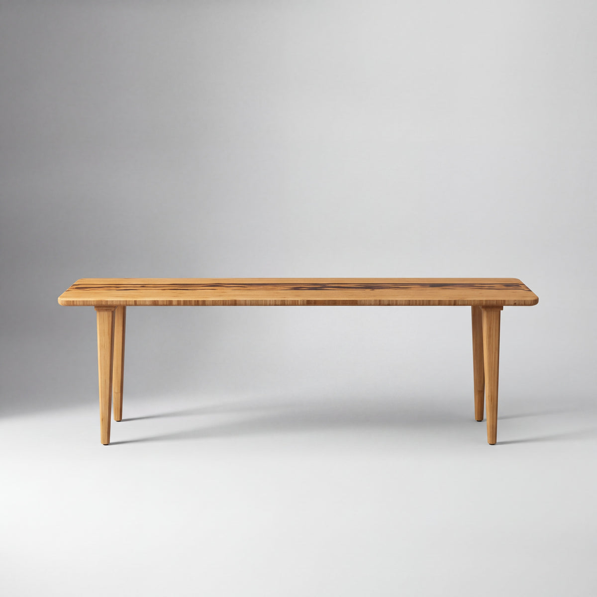 Greenington Azara Bench in Caramelized bamboo, shown on a plain background