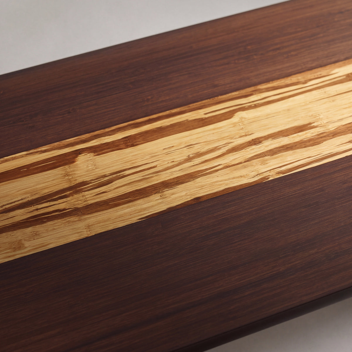 Close-up of the bamboo grain on the Greenington Azara Bench in Sable bamboo