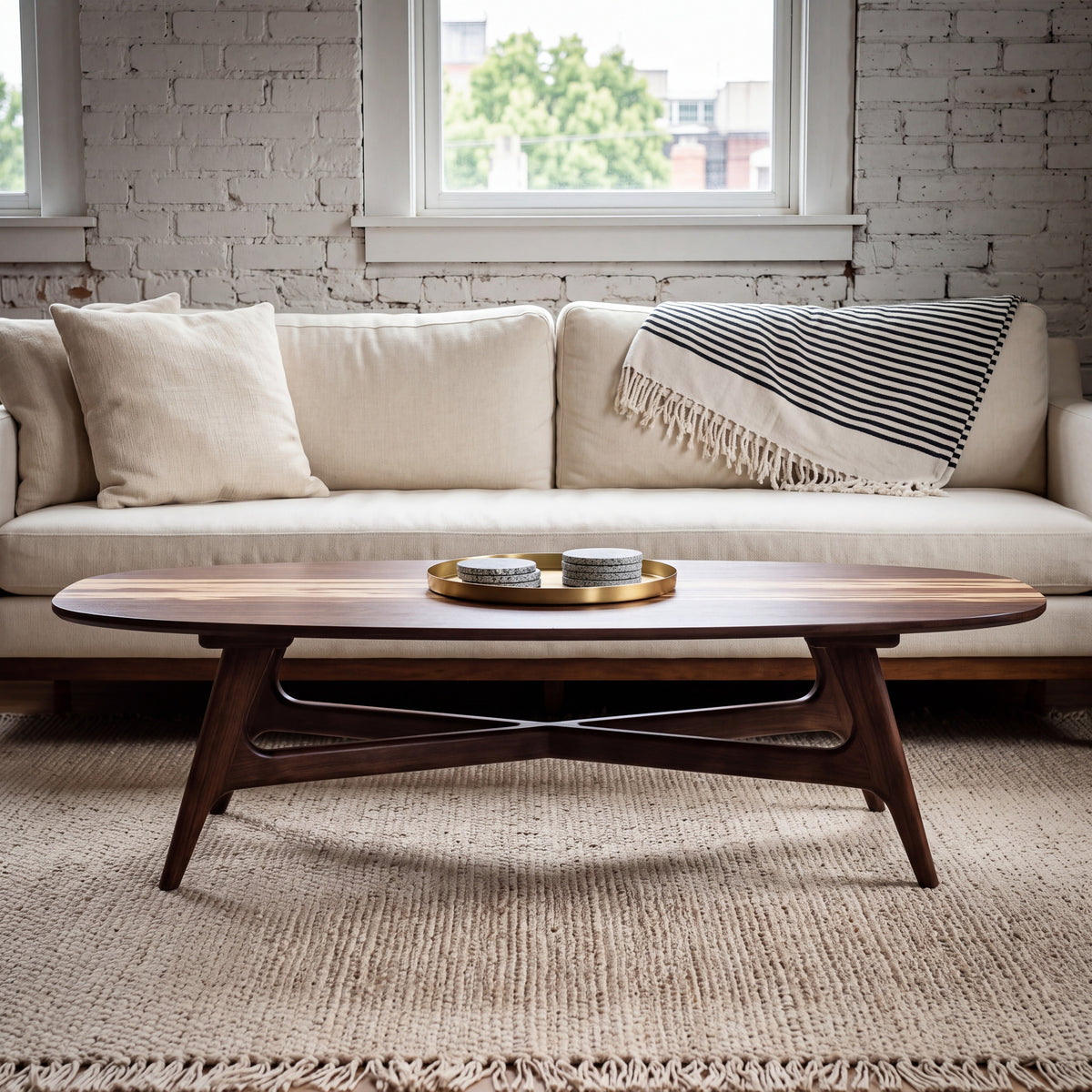 Greenington Azara Ellipse Coffee Table in Sable bamboo, in a living room setting