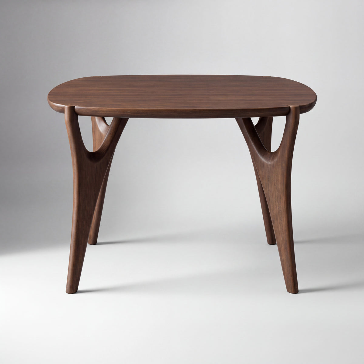 Greenington Belle Dining Table in Black Walnut bamboo, studio photo on a plain background
