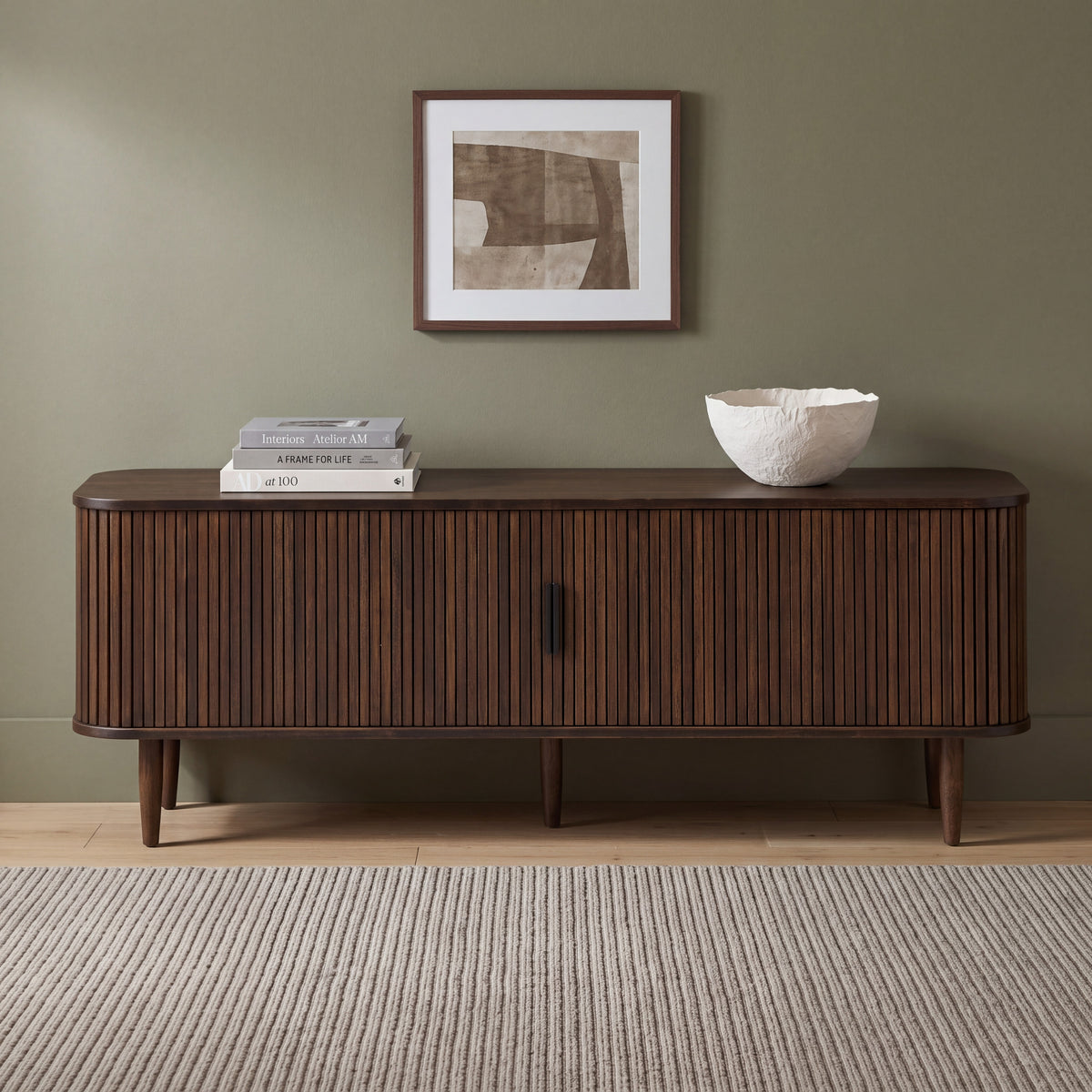 Greenington Carmel Console in Black Walnut bamboo, in a living room setting