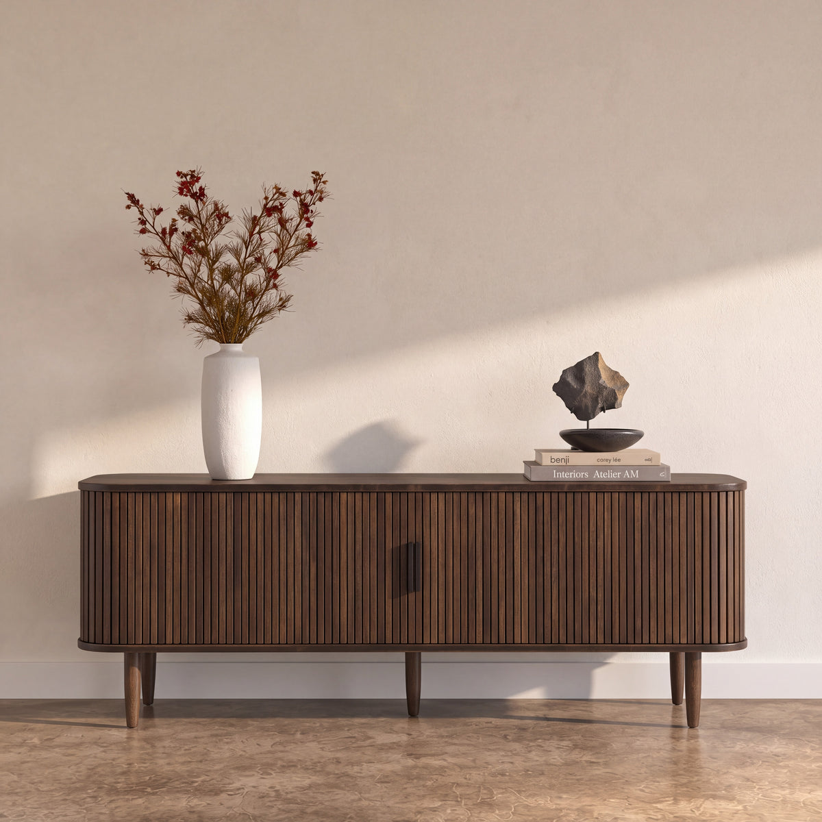 Greenington Carmel Console in Black Walnut bamboo, styled in a living room
