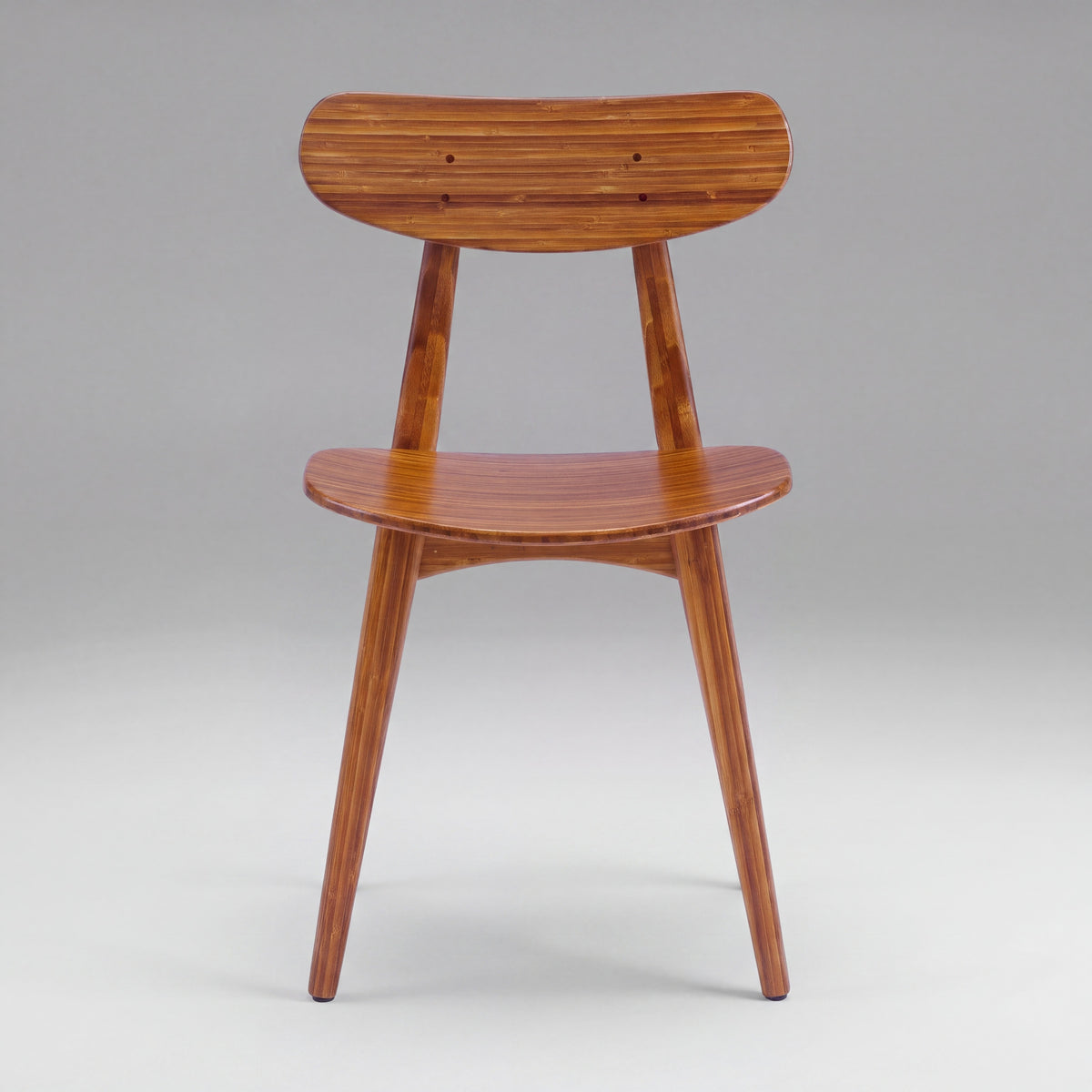 Greenington Cassia Dining Chair in Amber bamboo, shown on a plain background