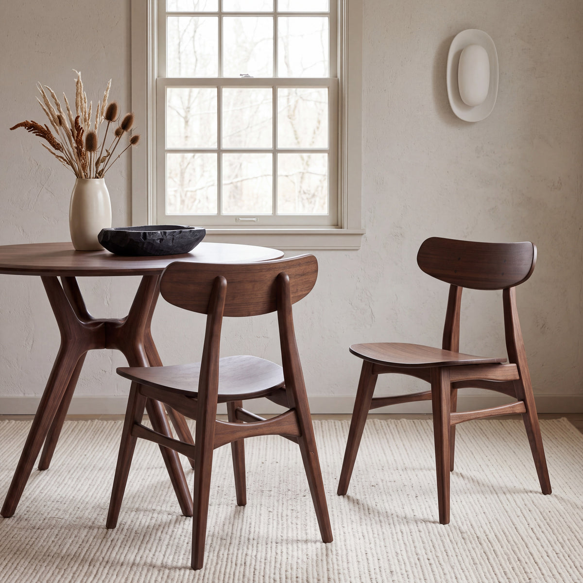 Greenington Cassia Dining Chair in Black Walnut bamboo, shown in a dining room