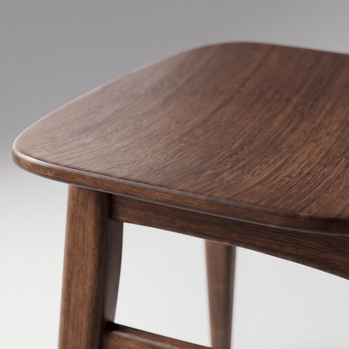 Close-up of the seat on the Greenington Cassia Dining Chair in Black Walnut bamboo