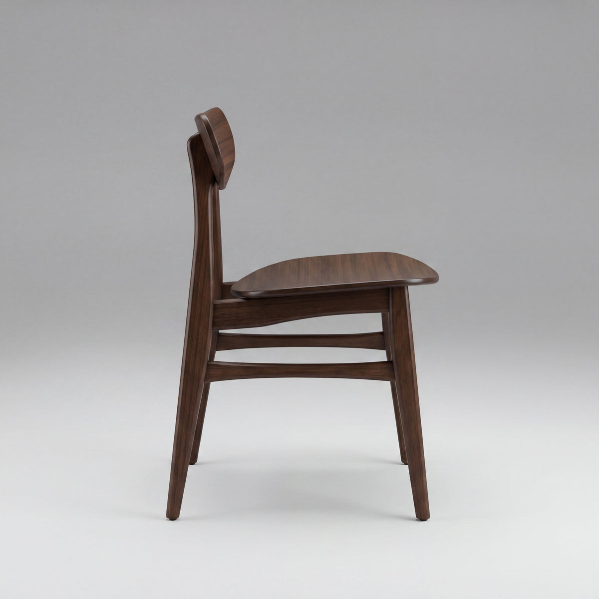 Greenington Cassia Dining Chair in Black Walnut bamboo, on a studio background