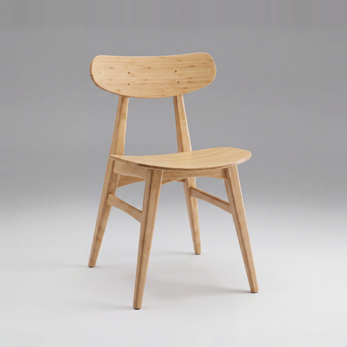 Greenington Cassia Dining Chair in Wheat bamboo, on a studio background
