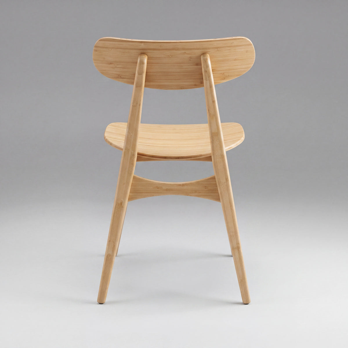 Greenington Cassia Dining Chair in Wheat bamboo, on a studio background