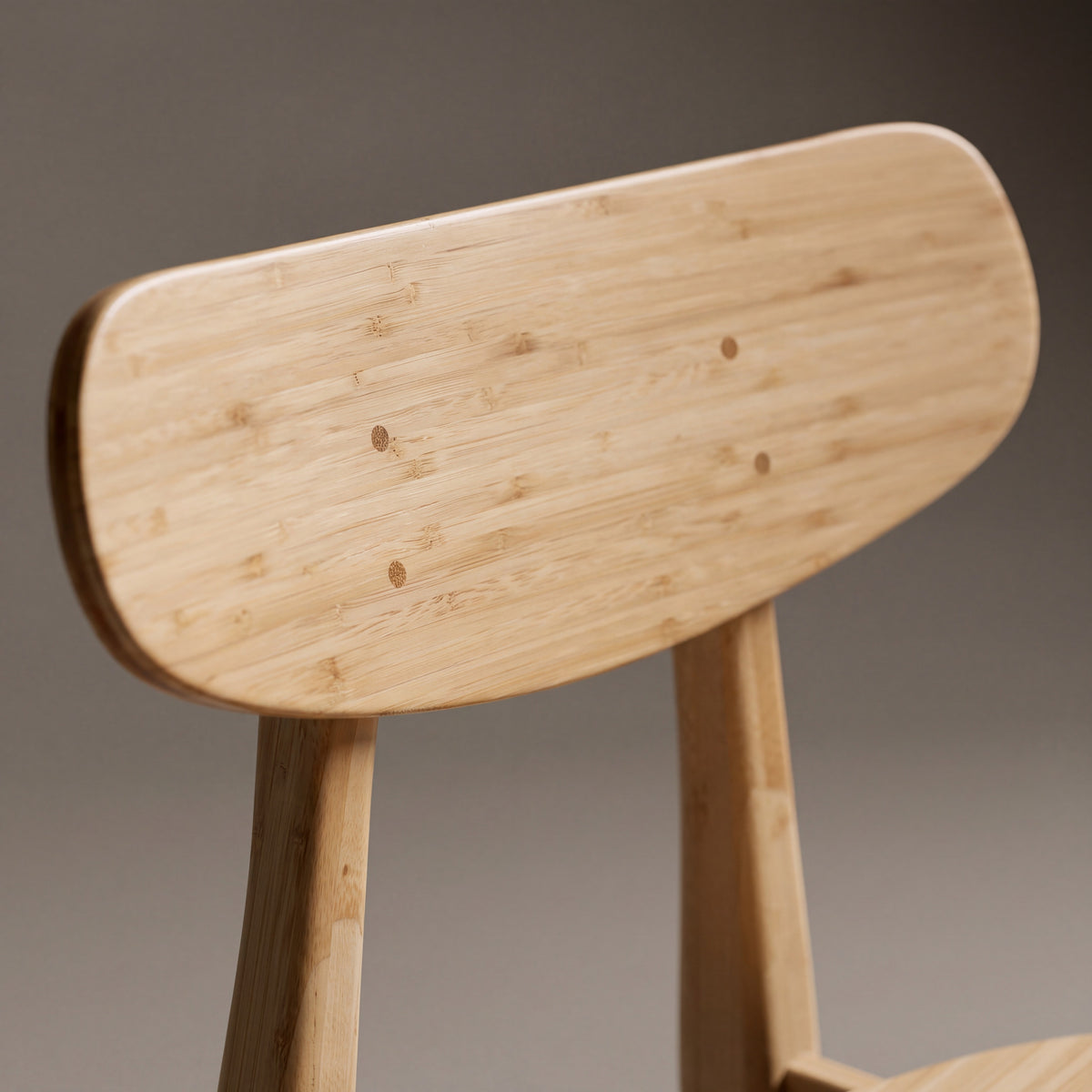 Close-up of the backrest on the Greenington Cassia Dining Chair in Wheat bamboo