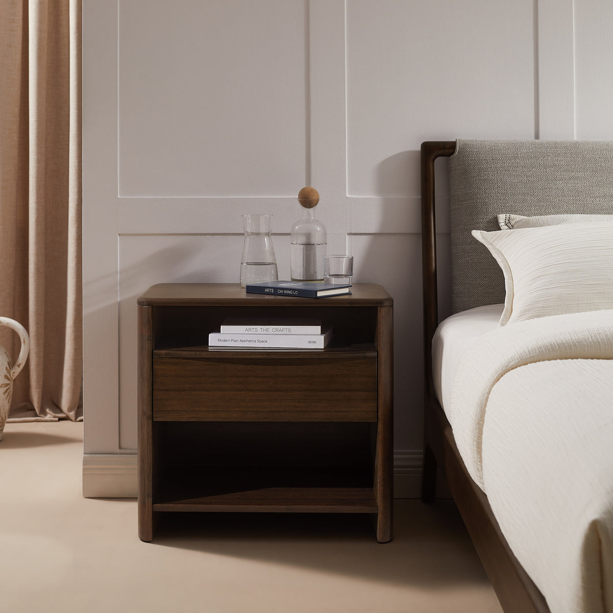 Greenington Catalina Nightstand in Black Walnut bamboo, styled in a bedroom