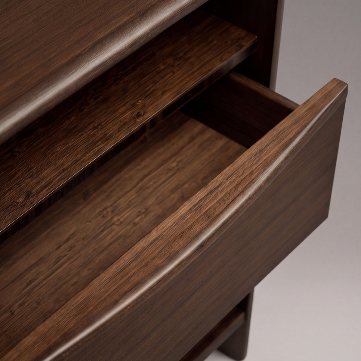 Close-up of the drawer and pull on the Greenington Catalina Nightstand in Black Walnut bamboo
