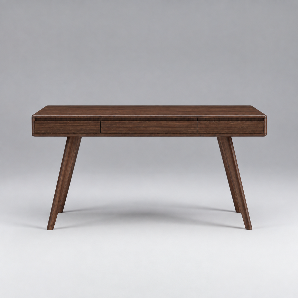 Greenington Currant Writing Desk in Black Walnut bamboo, on a studio background