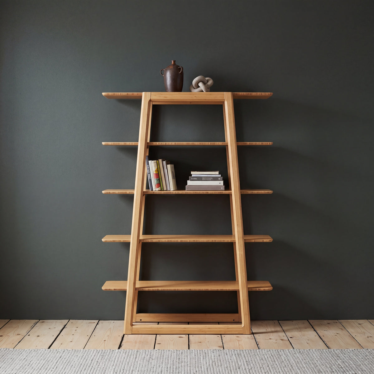 Greenington Currant Bookshelf in Caramelized bamboo, styled in a living room