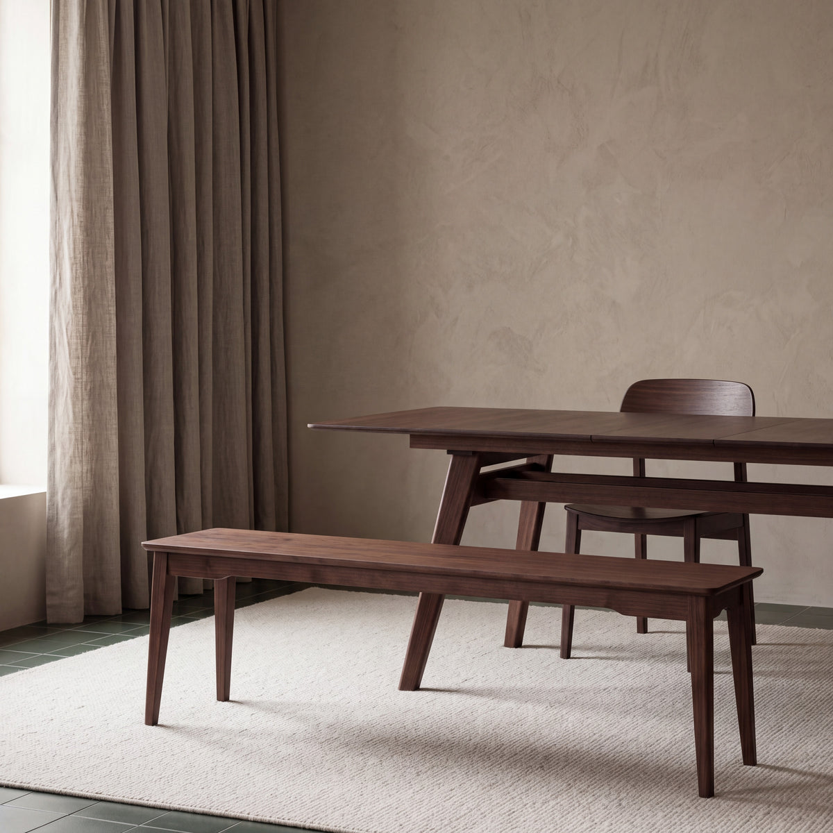 Greenington Currant Long Bench in Black Walnut bamboo, styled in a dining room