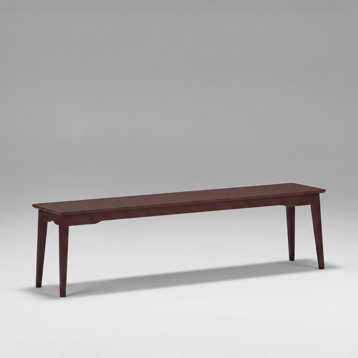 Greenington Currant Long Bench in Black Walnut bamboo, on a studio background