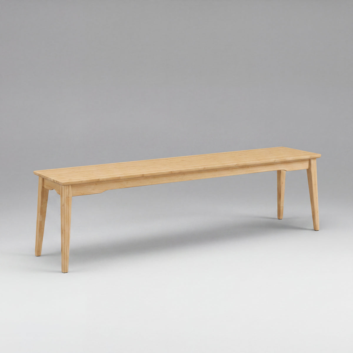 Greenington Currant Long Bench in Caramelized bamboo, on a studio background