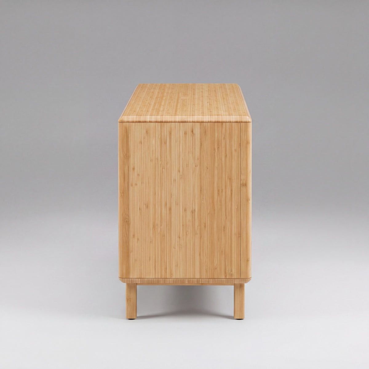 Greenington Currant Media Table in Caramelized bamboo, studio photo on a plain background