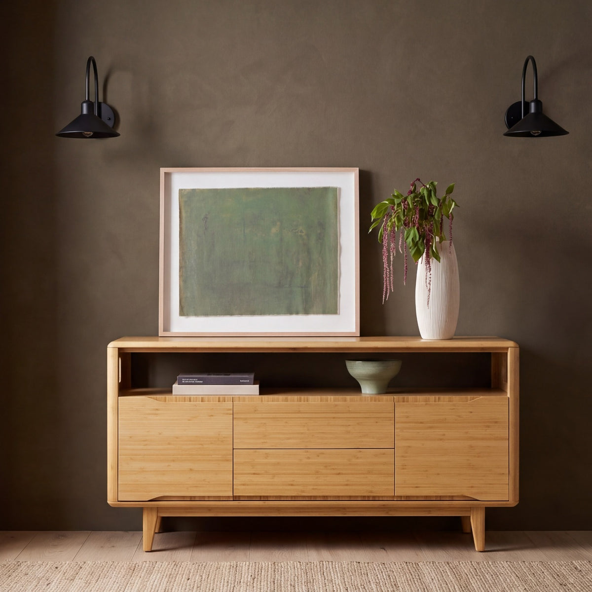 Greenington Currant Media Table in Caramelized bamboo, shown in a living room