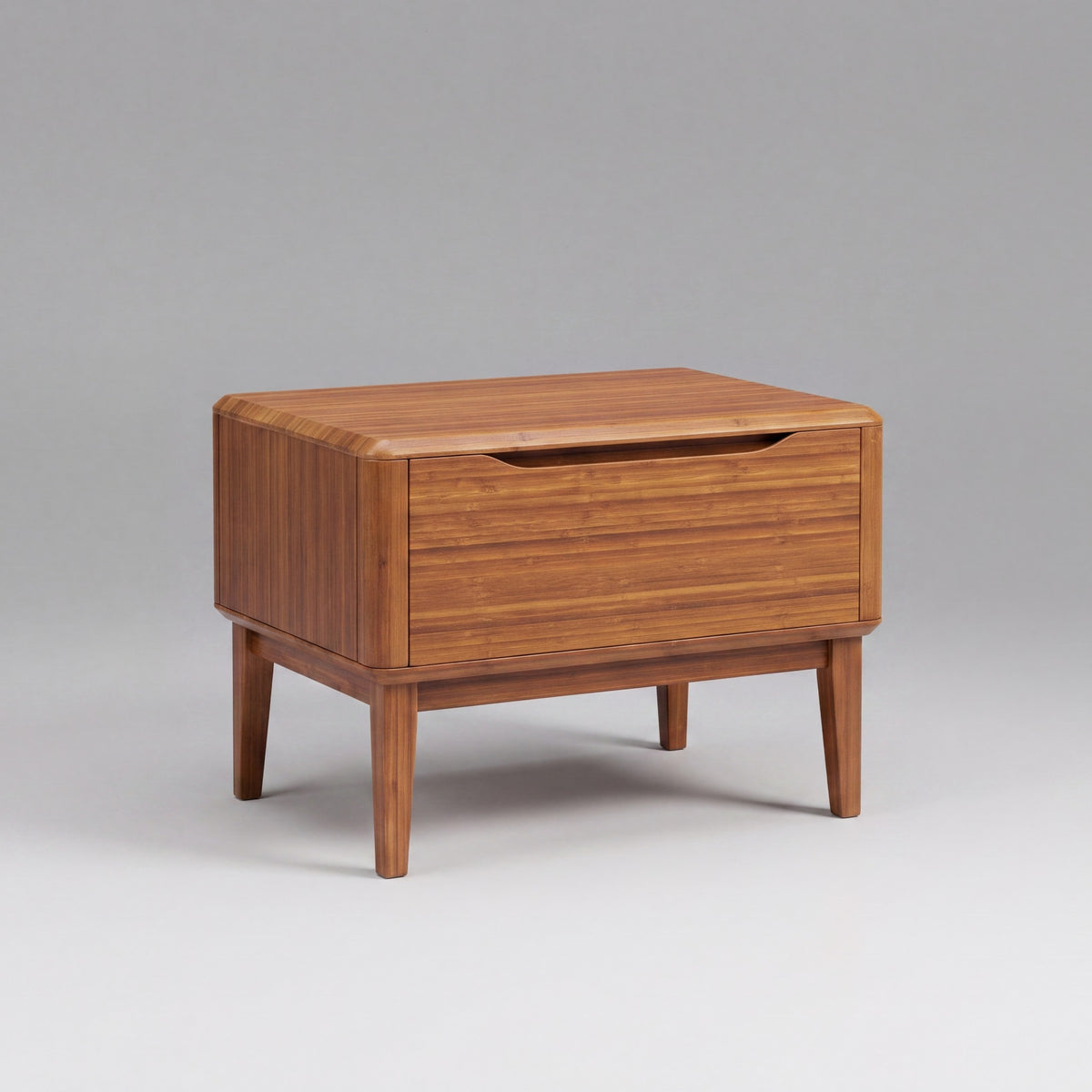 Greenington Currant Nightstand in Amber bamboo, shown on a plain background