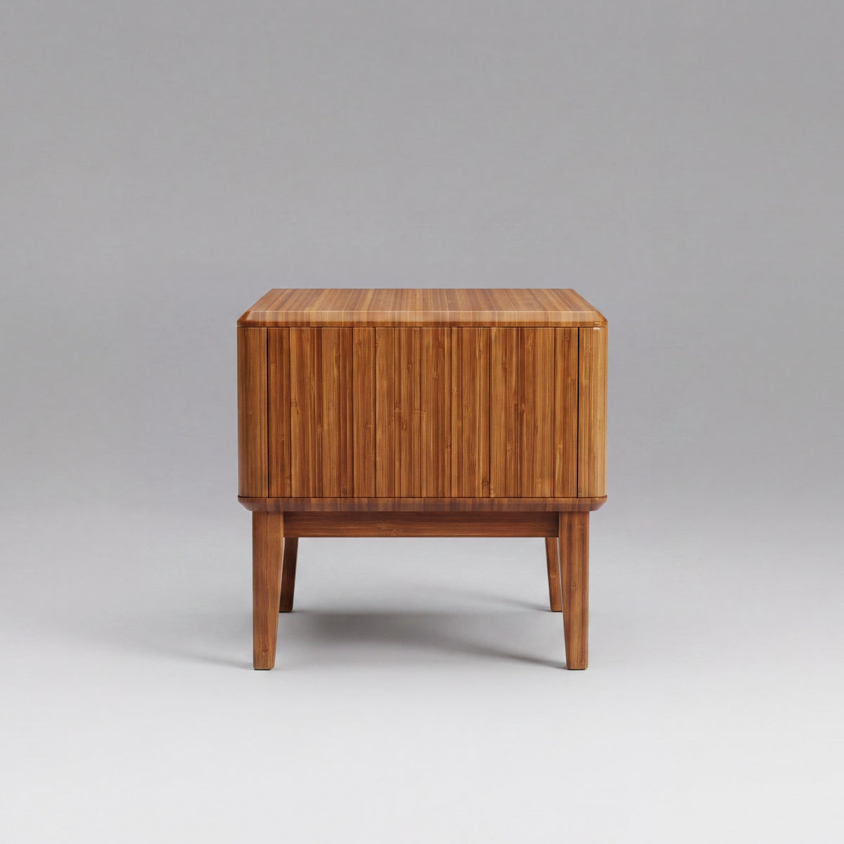 Greenington Currant Nightstand in Amber bamboo, studio photo on a plain background