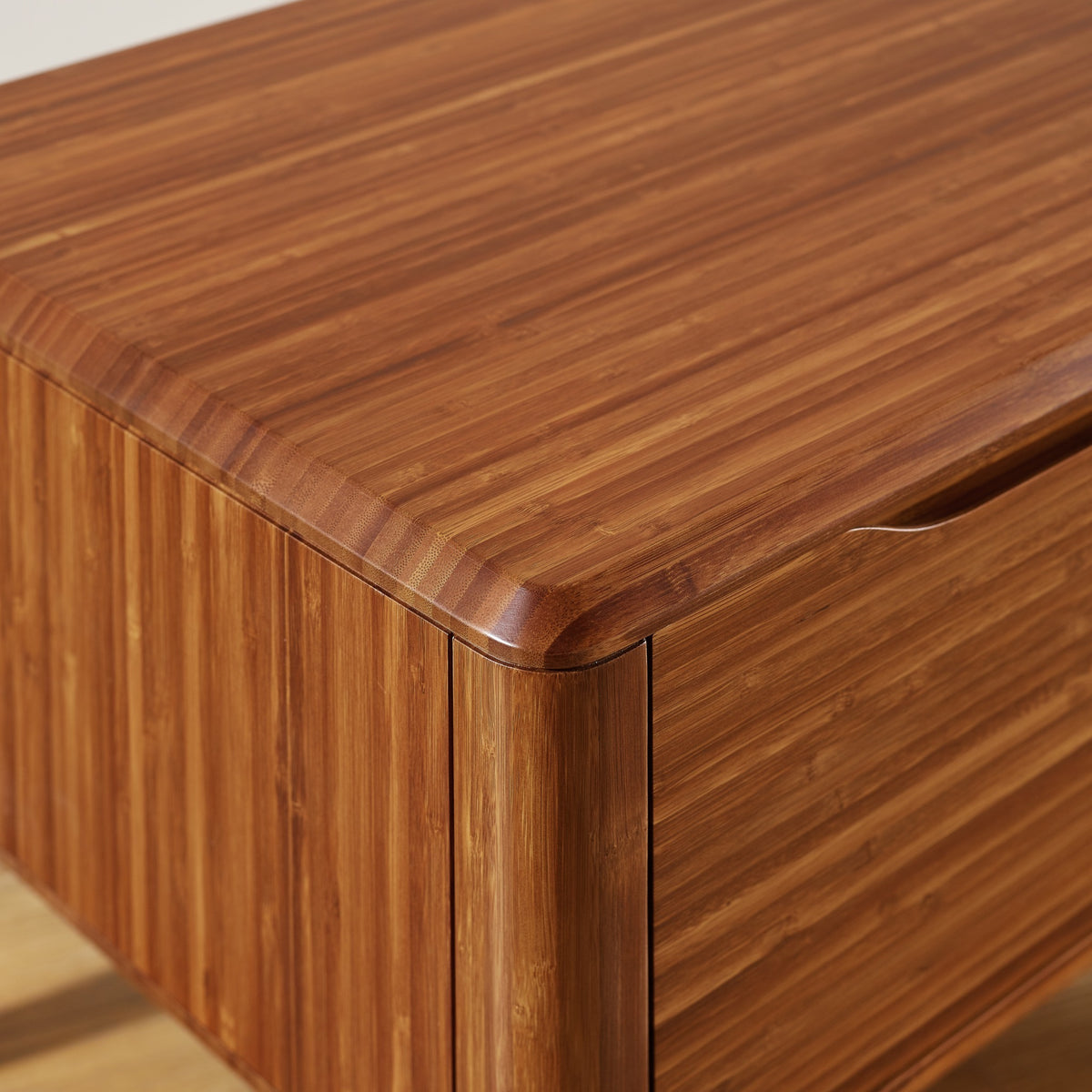 Detail of the drawer joinery on the Greenington Currant Nightstand in Amber bamboo