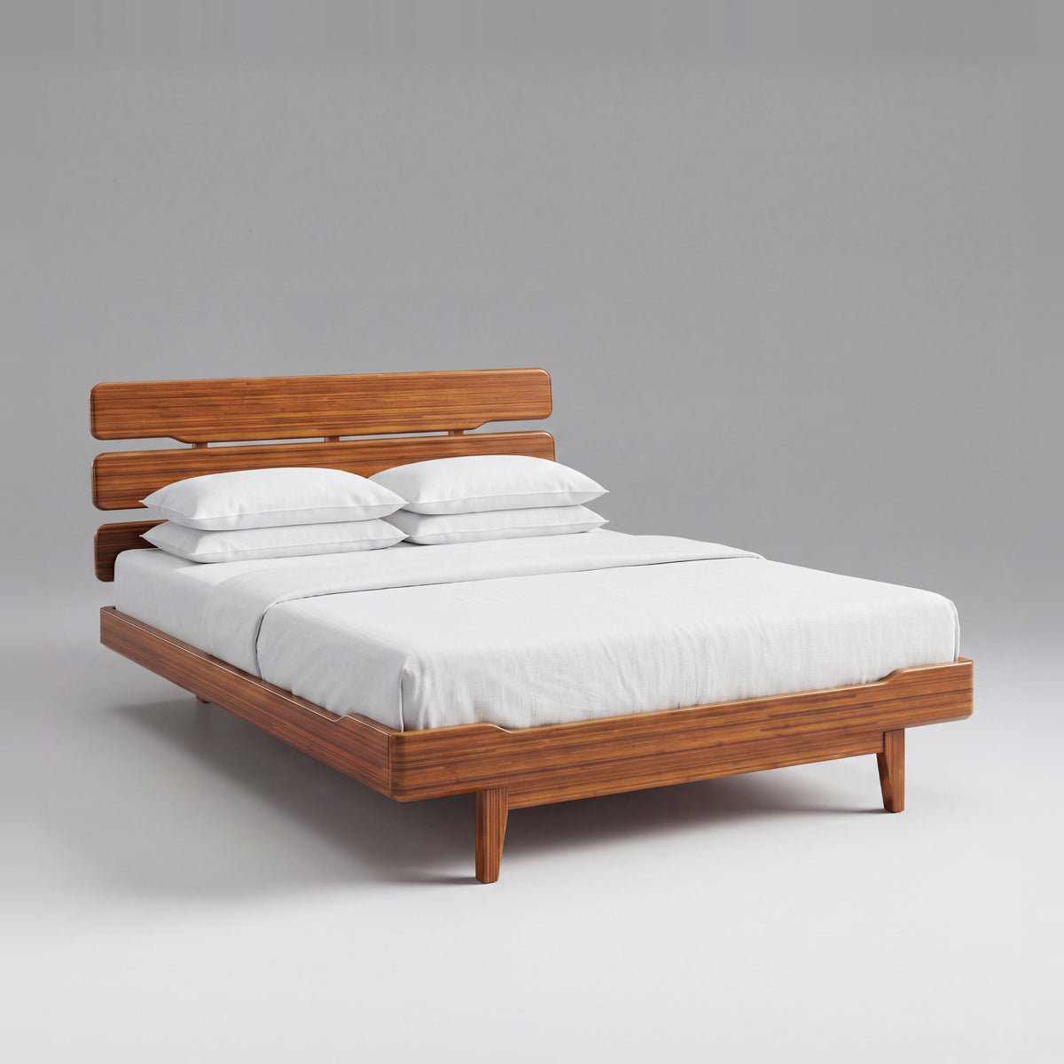 Greenington Currant Platform Bed in Amber bamboo, on a studio background