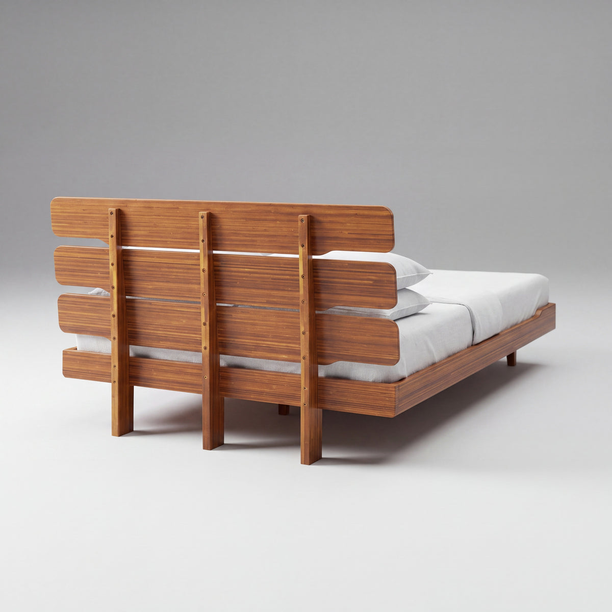 Greenington Currant Platform Bed in Amber bamboo, studio photo on a plain background