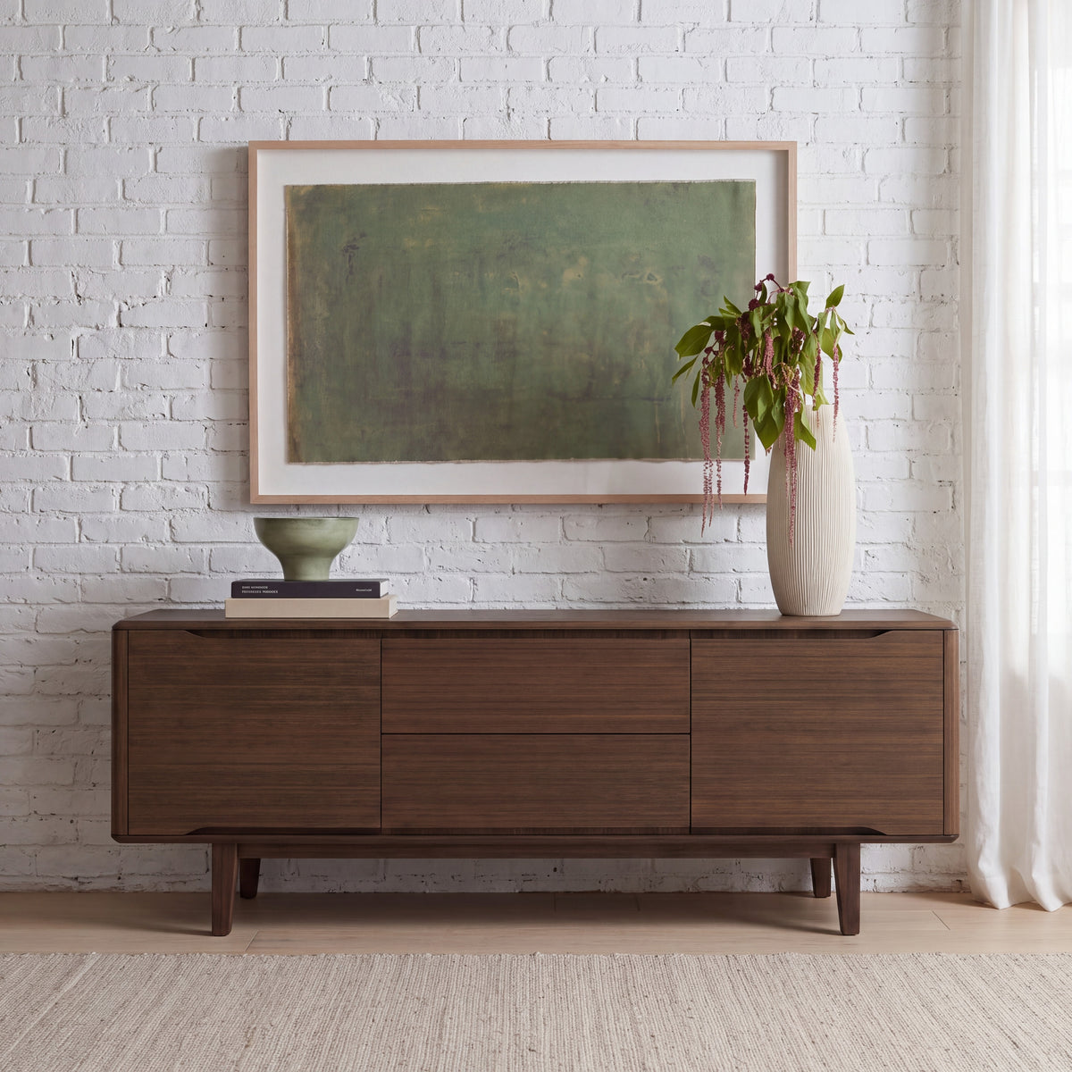 Greenington Currant Sideboard/Media Center in Black Walnut bamboo, in a living room setting