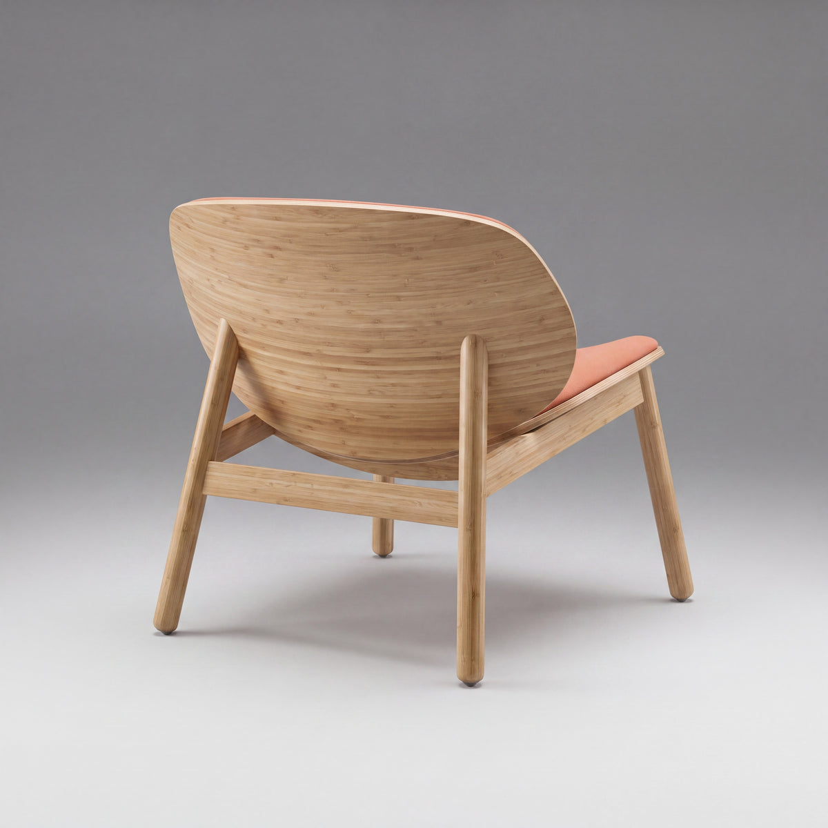 Greenington Danica Chair in Red fabric with a Wheat bamboo frame, on a studio background