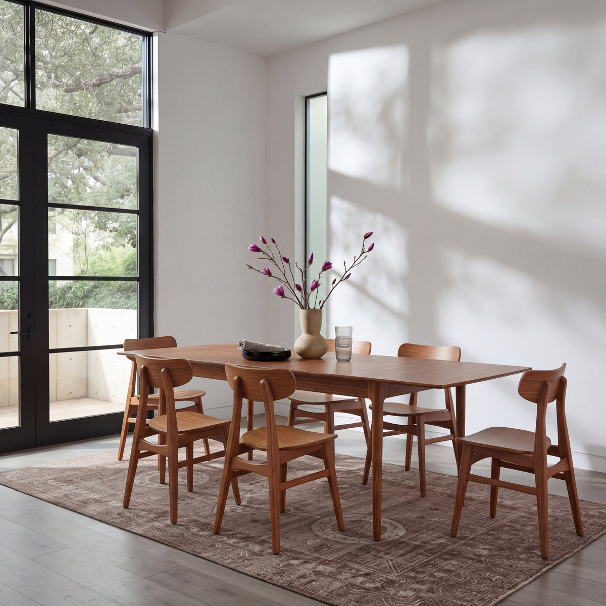 Greenington Erikka Dining Table in Amber bamboo, in a dining room setting