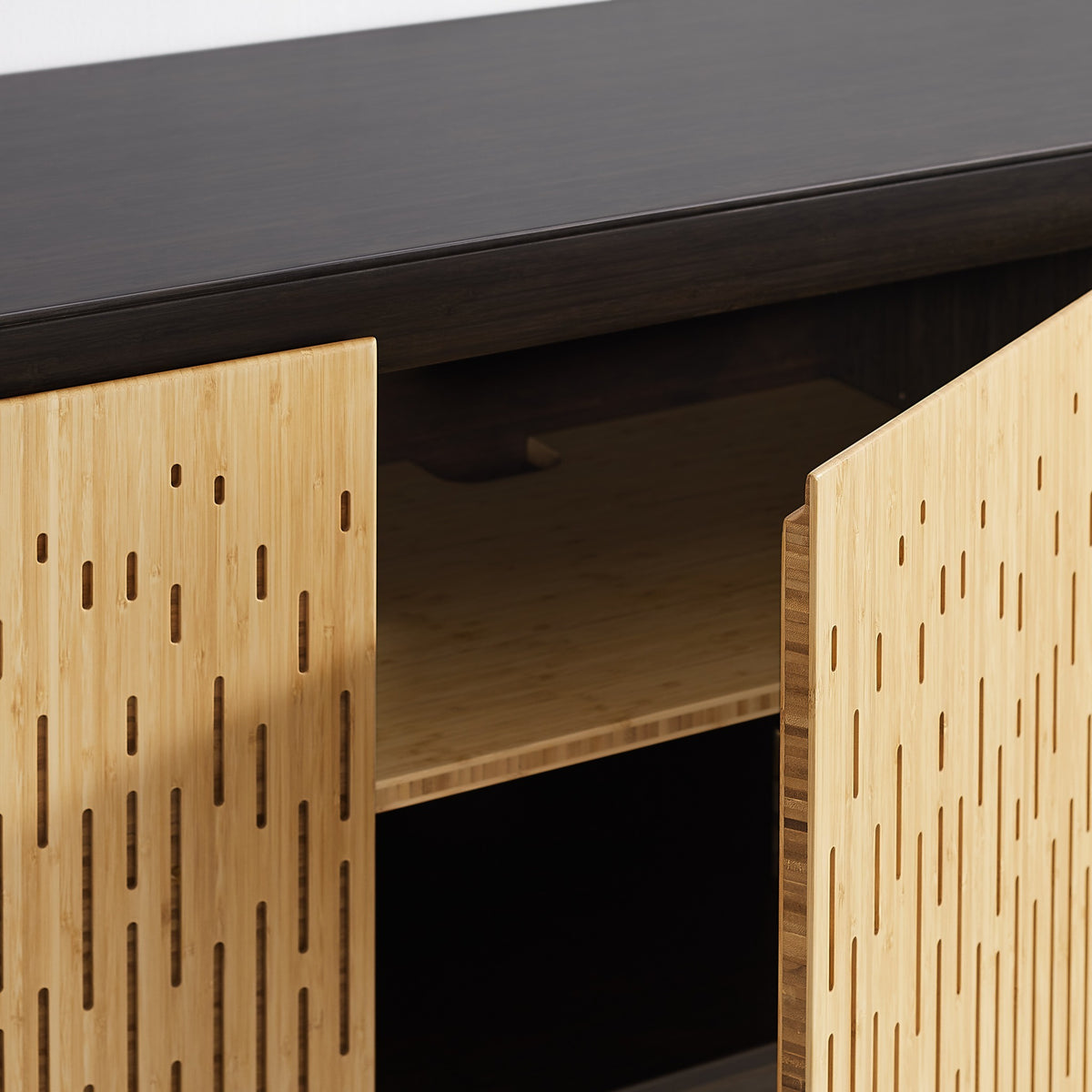 Close-up of the door and handle on the Greenington Hanna Console Caviar in Caviar and Wheat bamboo