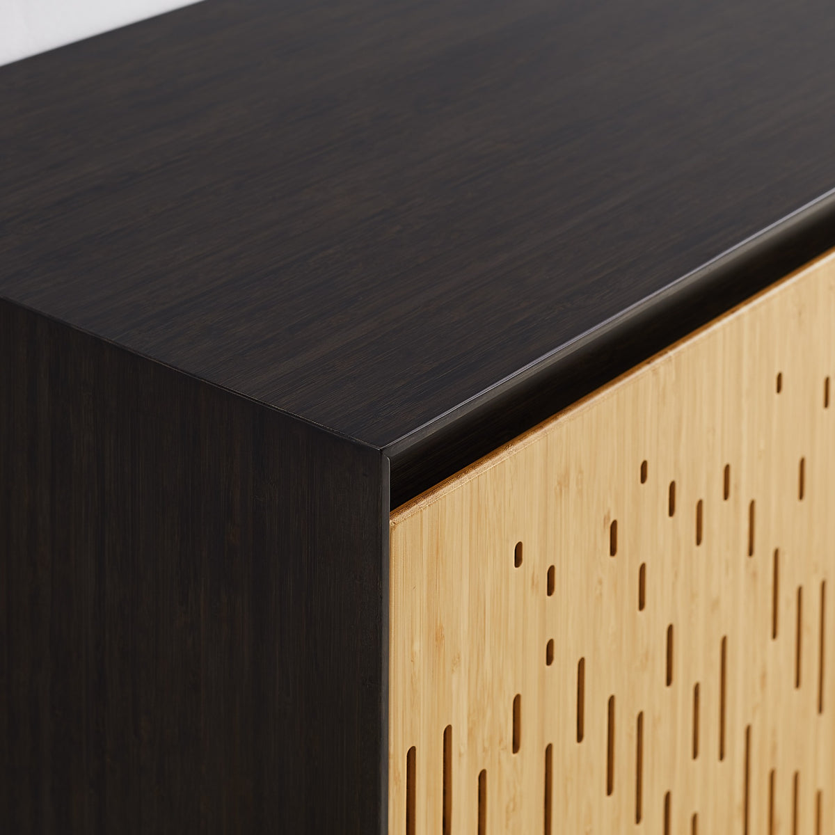 Close-up of the fluted front on the Greenington Hanna Console Caviar in Caviar and Wheat bamboo