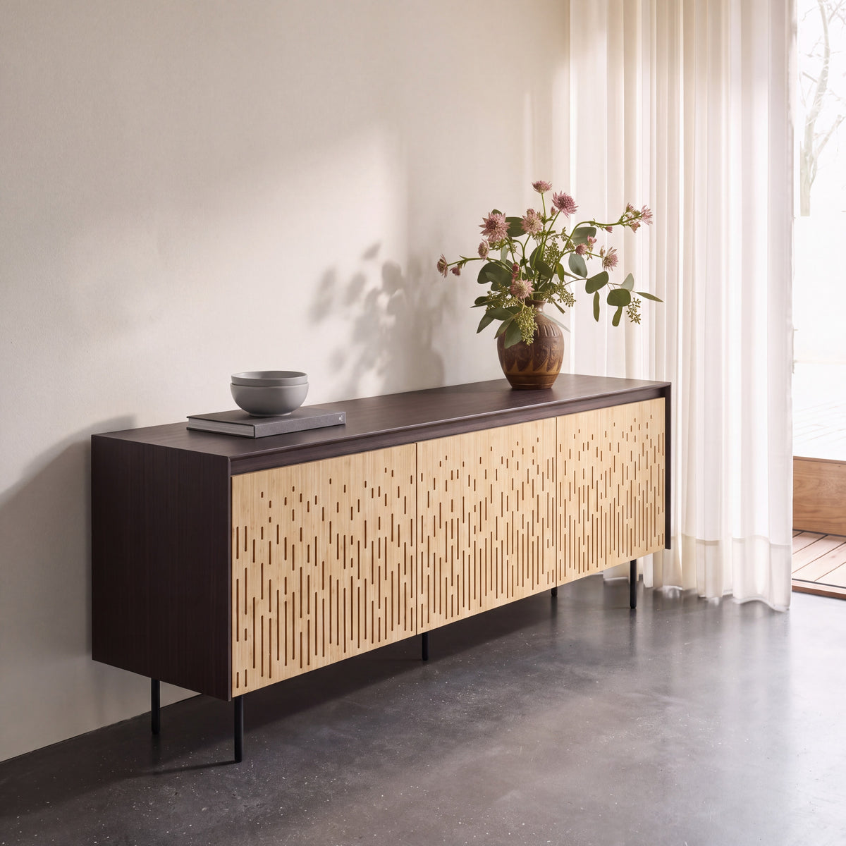 Greenington Hanna Console Caviar in Caviar and Wheat bamboo, shown in a living room