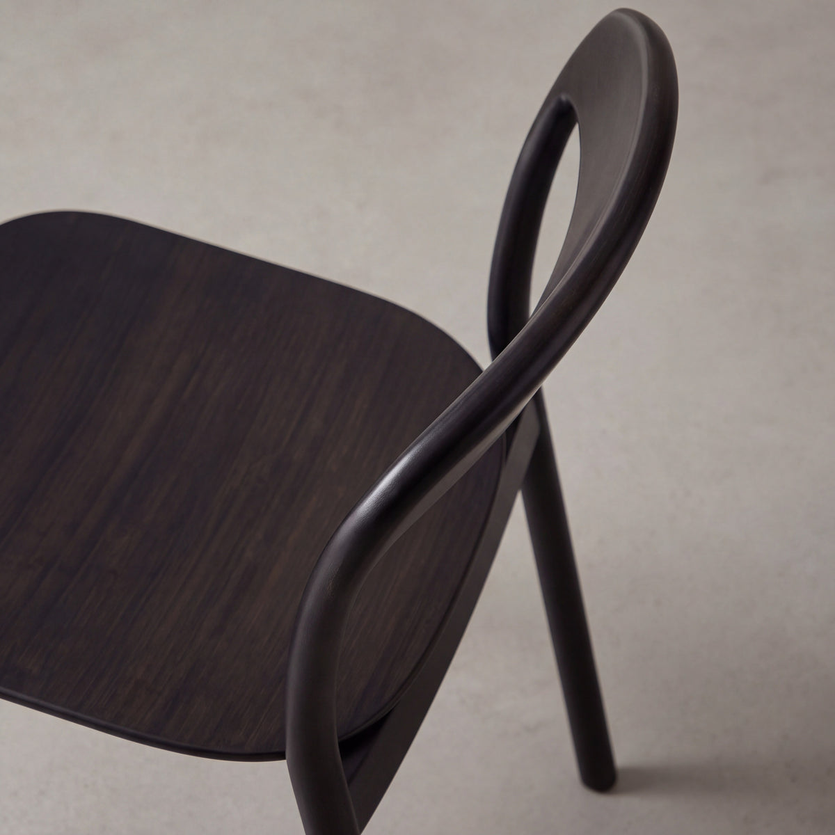 Close-up of the backrest on the Greenington Hanna Dining Chair in Caviar bamboo
