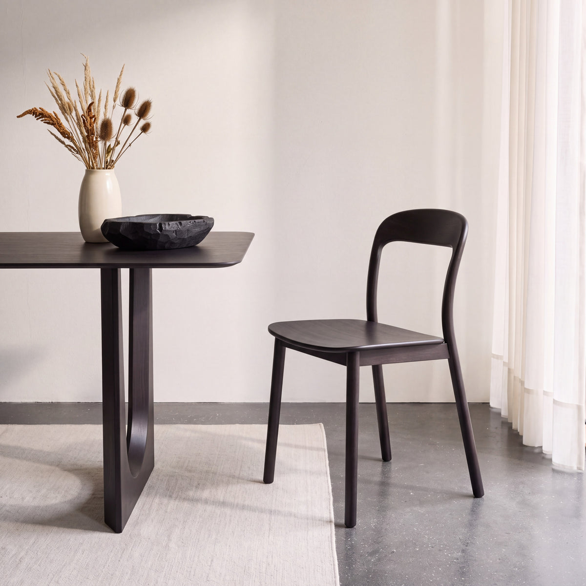 Greenington Hanna Dining Chair in Caviar bamboo, pictured in a dining room