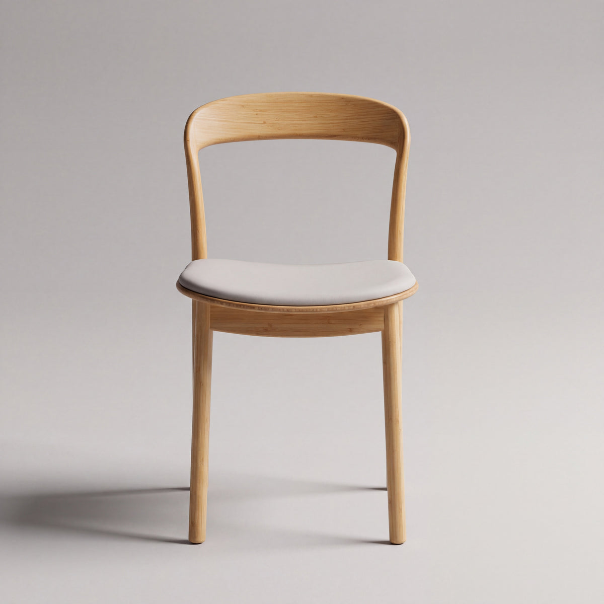 Greenington Hanna Dining Chair Leather Seat in Wheat bamboo with a Grey leather seat, shown on a plain background