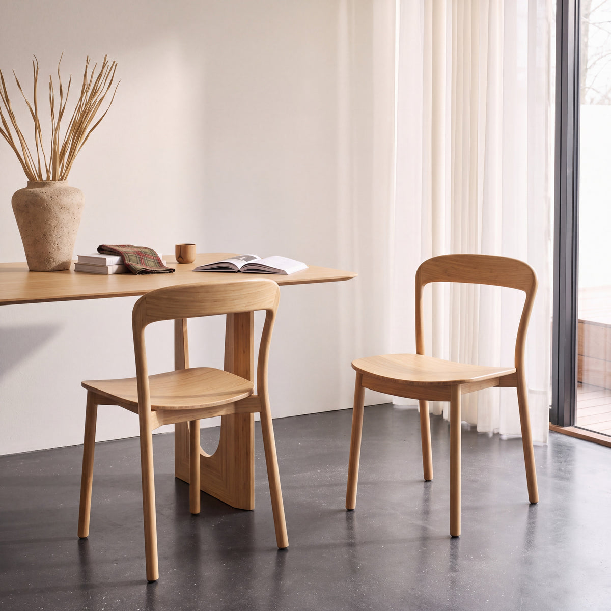 Greenington Hanna Dining Chair in Wheat bamboo, pictured in a dining room