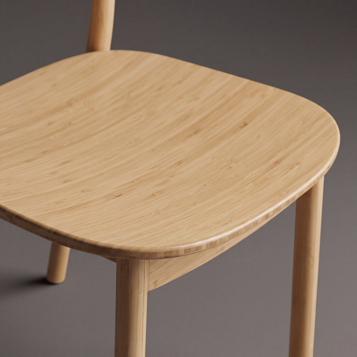 Close-up of the seat on the Greenington Hanna Dining Chair in Wheat bamboo