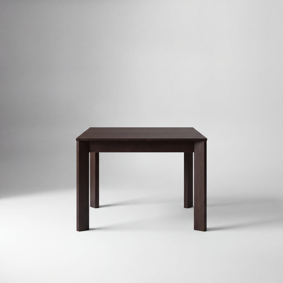Greenington Hudson Dining Table in Black Walnut bamboo, studio photo on a plain background