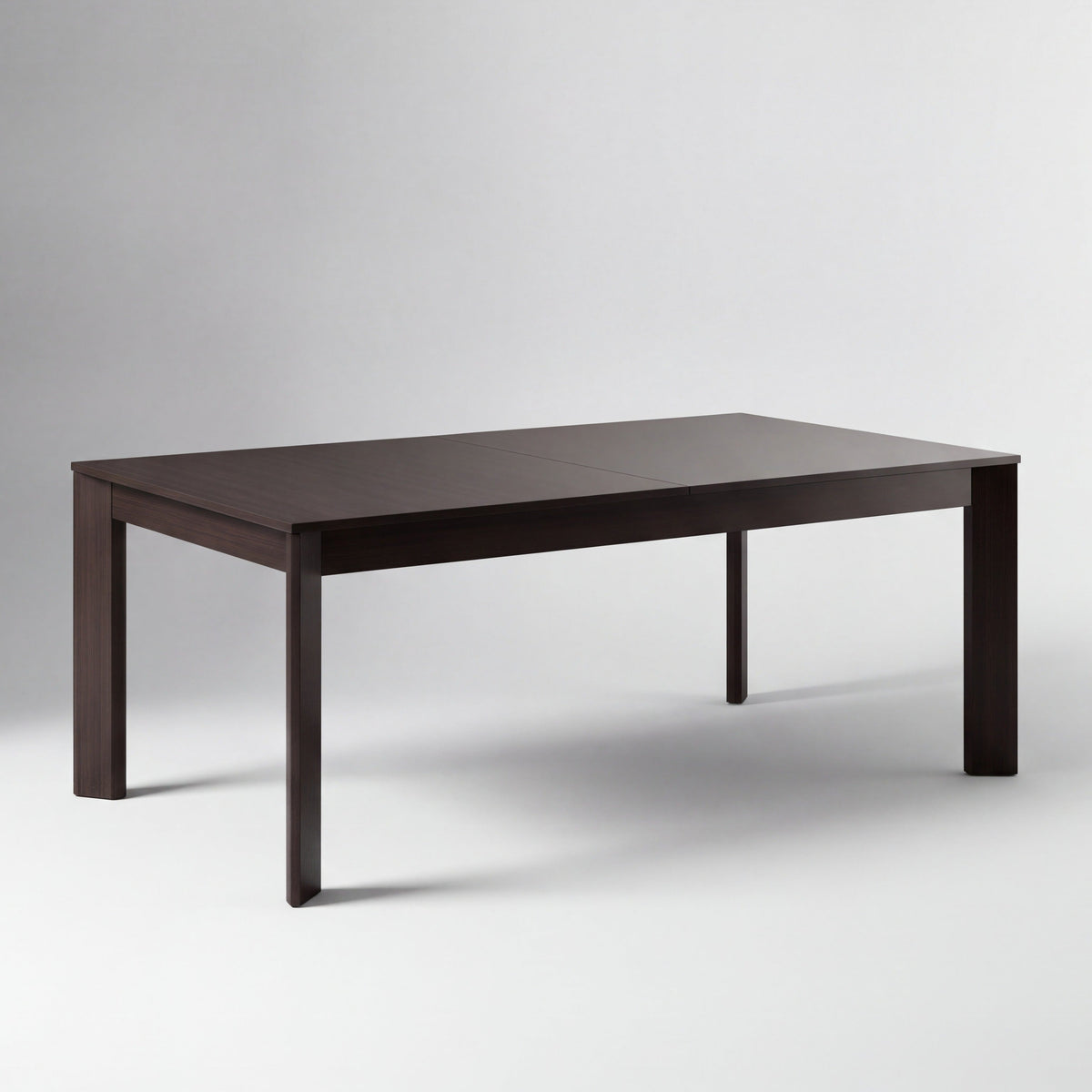 Greenington Hudson Dining Table in Black Walnut bamboo, on a studio background