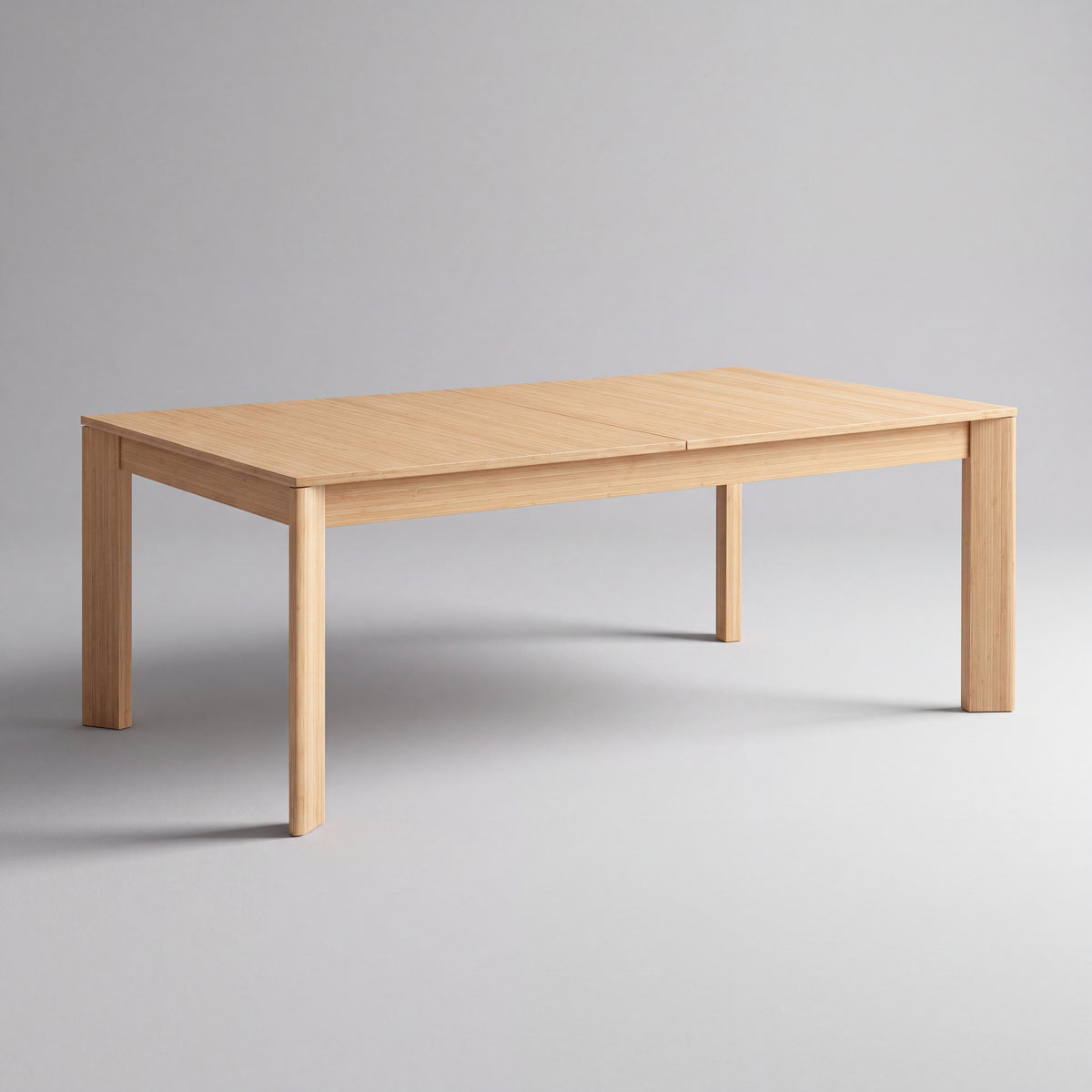 Greenington Hudson Dining Table in Wheat bamboo, on a studio background