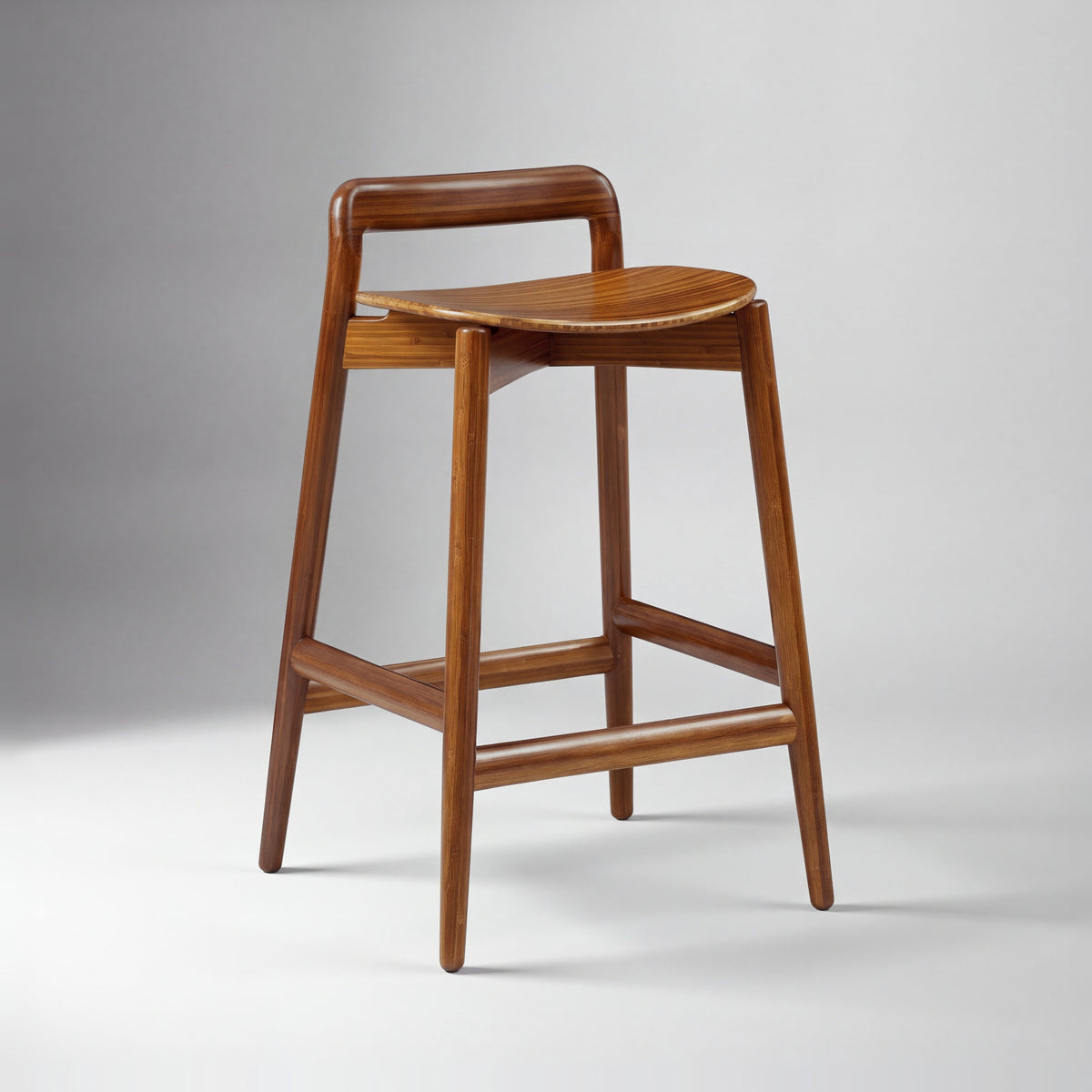 Greenington Linna Counter Stool in Amber bamboo, on a studio background