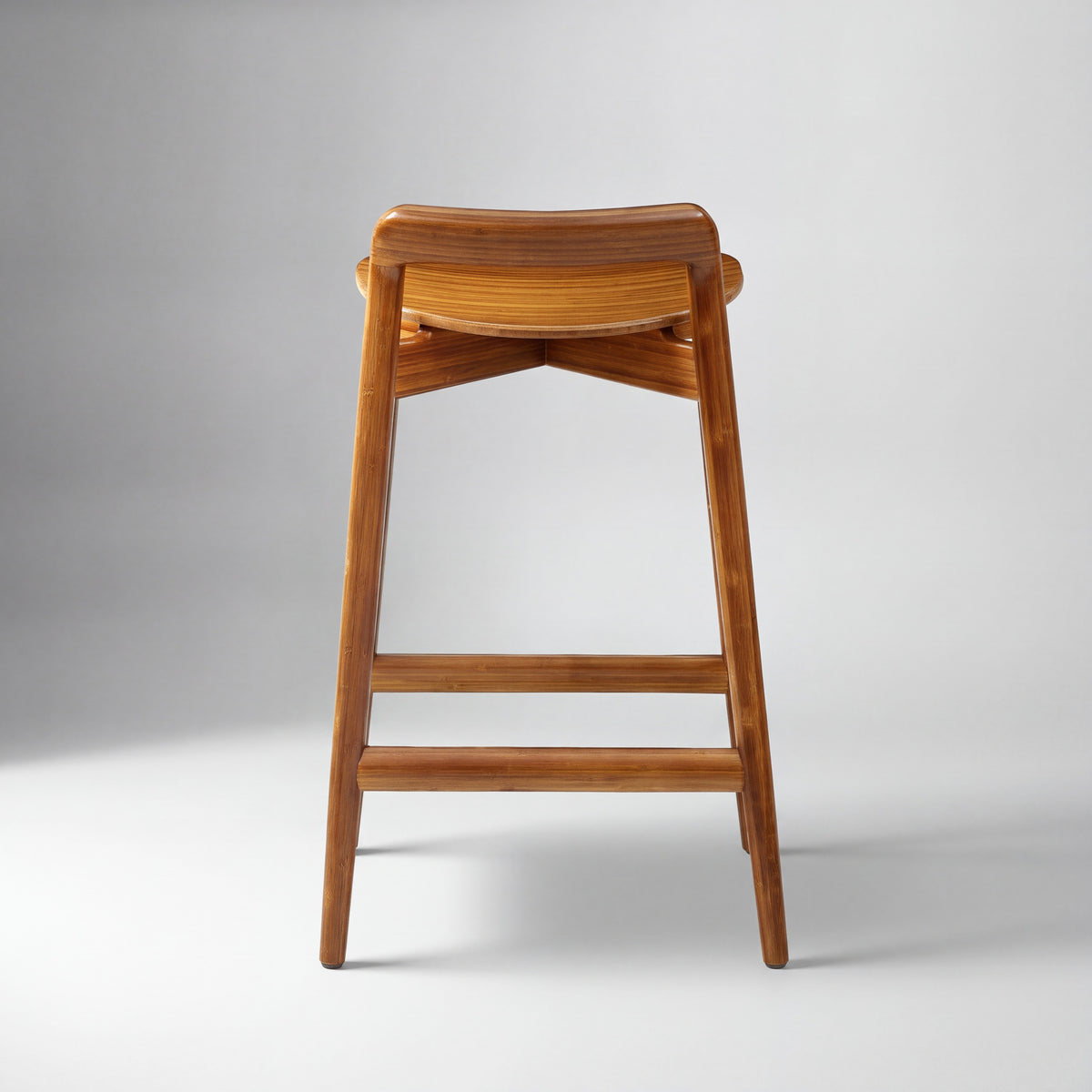 Greenington Linna Counter Stool in Amber bamboo, on a studio background